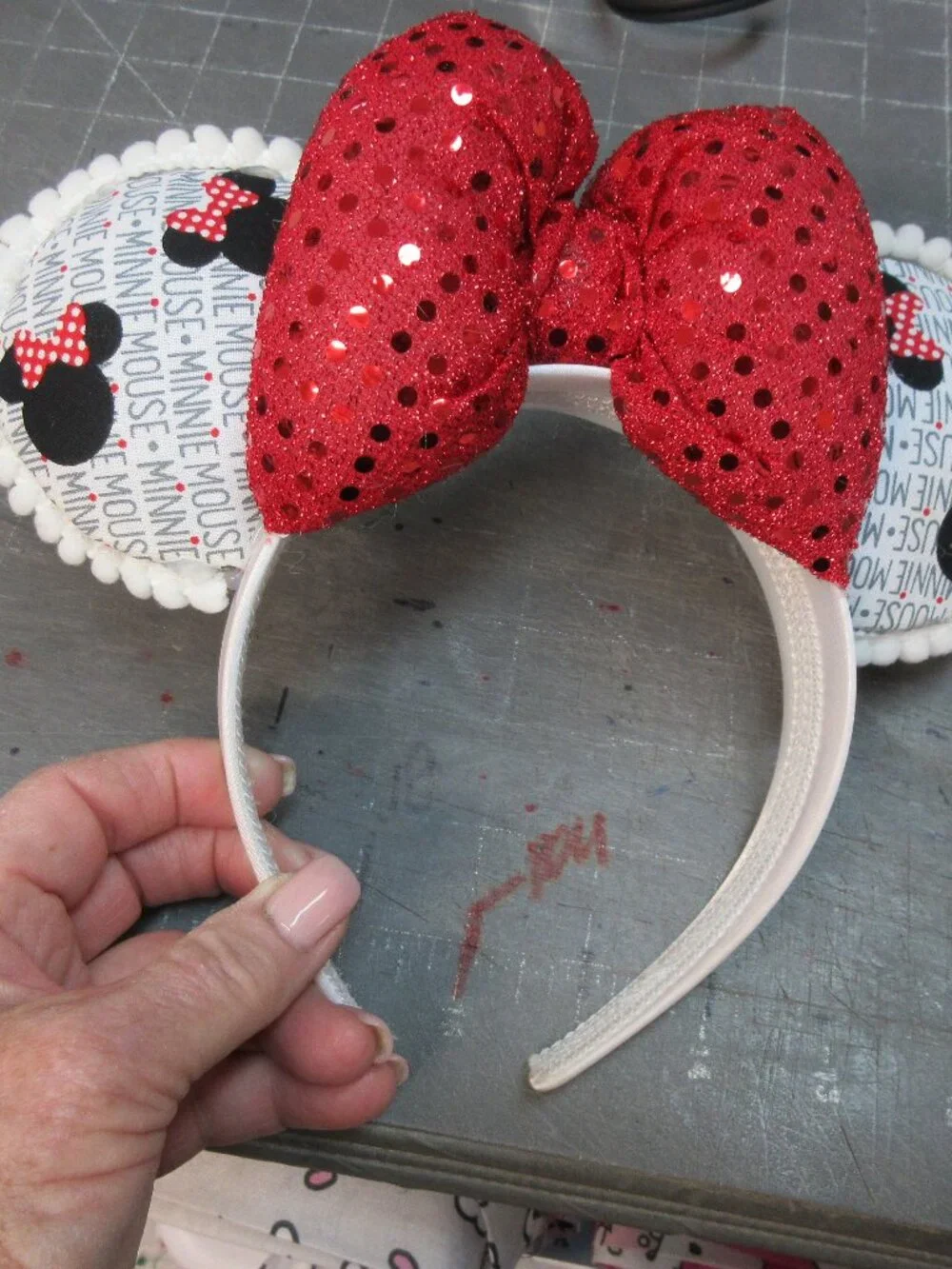 Minnie Mouse Ears - White trim, red Sequin bow fits an adult